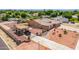 Wide lot with RV, shed and garden area, perfect for outdoor hobbies and storage, located on a paved road at 10535 W San Miguel Ave, Glendale, AZ 85307