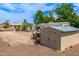 Spacious backyard with an RV, shed, and various equipment, offering plenty of space for storage and projects at 10535 W San Miguel Ave, Glendale, AZ 85307