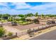Expansive backyard featuring a large dirt area, established landscaping, perfect for outdoor activities and relaxation at 10535 W San Miguel Ave, Glendale, AZ 85307