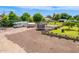 Extensive backyard with a shed, trampoline, RV, and grassy area, ideal for outdoor enjoyment and storage at 10535 W San Miguel Ave, Glendale, AZ 85307