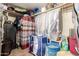 Organized closet with shelving, clothes racks, and storage containers at 10535 W San Miguel Ave, Glendale, AZ 85307