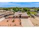 Expansive single-story home with a tile roof, three-car garage, and desert landscaping at 10535 W San Miguel Ave, Glendale, AZ 85307