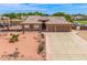Beautiful home with a three-car garage, desert-style landscaping, perfect for relaxing in your private oasis at 10535 W San Miguel Ave, Glendale, AZ 85307