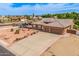Stunning home showcasing mature landscaping and a spacious driveway leading to an attached three-car garage at 10535 W San Miguel Ave, Glendale, AZ 85307