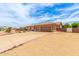 Spacious single-story house with three-car garage and gravel landscaping with mature trees at 10535 W San Miguel Ave, Glendale, AZ 85307