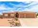 Lovely single-story home showcases a tile roof, three-car garage, and minimal landscaping at 10535 W San Miguel Ave, Glendale, AZ 85307