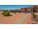 Home features a well-maintained walkway leading up to its attractive facade and unique xeriscaped yard at 10535 W San Miguel Ave, Glendale, AZ 85307