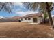 Wide view of the expansive backyard that is walled on all sides at 10625 E Bramble Ave, Mesa, AZ 85208