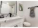 Stylish bathroom featuring a granite countertop and decorated with trendy decor at 10625 E Bramble Ave, Mesa, AZ 85208