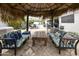 Backyard oasis featuring an outdoor palapa, lush landscaping and a pool at 11430 N 109Th St, Scottsdale, AZ 85259