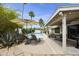 Backyard featuring a pool and a covered patio with chairs at 11430 N 109Th St, Scottsdale, AZ 85259