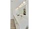 Bathroom featuring double sinks, white cabinetry, and plenty of vanity counterspace at 11430 N 109Th St, Scottsdale, AZ 85259