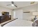 Neutral bedroom featuring wood floors, ceiling fan, and furniture at 11430 N 109Th St, Scottsdale, AZ 85259