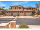 Condominium property with a row of garages with tile roofs at 11500 E Cochise Dr # 2001, Scottsdale, AZ 85259