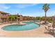 Gorgeous community pool area with desert landscaping and inviting lounge chairs at 11500 E Cochise Dr # 2001, Scottsdale, AZ 85259