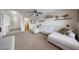 Spacious living room with comfortable sectional sofa, neutral carpet, and ceiling fan at 11563 W Jefferson St, Avondale, AZ 85323