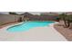 Inviting backyard pool offers a refreshing escape with its clean, curved design and ample space for lounging at 11563 W Jefferson St, Avondale, AZ 85323