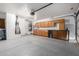Large garage with cabinets and plenty of open space for storage and projects at 11622 W Buck Mountain Ct, Surprise, AZ 85378