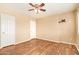 Bedroom with laminate flooring and standard closet at 12325 W Canterbury Dr, El Mirage, AZ 85335