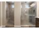 Clean and modern tiled walk-in shower in main bathroom at 12516 W Mclellan Ct, Glendale, AZ 85307