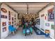 Spacious garage with ample space, decorated with Broncos memorabilia at 13629 W San Miguel Ave, Litchfield Park, AZ 85340