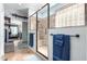 Walk-in shower with glass enclosure and decorative tile at 13629 W San Miguel Ave, Litchfield Park, AZ 85340