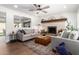 Cozy living room featuring a fireplace, comfortable seating, and stylish decor at 15038 N 22Nd St, Phoenix, AZ 85022