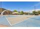 Well-maintained basketball court with multiple hoops and shaded seating, perfect for active recreation at 15252 N 100Th St # 1147, Scottsdale, AZ 85260
