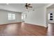Open-concept living space featuring recessed lights and attractive wood flooring at 15252 N 100Th St # 1147, Scottsdale, AZ 85260
