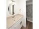 Bright bathroom featuring a vanity with black hardware, oval mirror, and tile shower at 15801 N 29Th N St # 20, Phoenix, AZ 85032