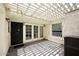 Covered patio with white trellis, textured walls, and modern lighting for outdoor enjoyment at 15801 N 29Th N St # 20, Phoenix, AZ 85032