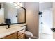 This bathroom features a new vanity, new faucet, and walk-in shower at 16071 W Sherman St, Goodyear, AZ 85338