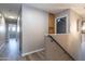 A second story hallway with wood floors at 16071 W Sherman St, Goodyear, AZ 85338