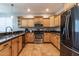 Modern kitchen featuring stainless steel appliances and sleek countertops at 16071 W Sherman St, Goodyear, AZ 85338