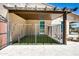 Backyard boasts a spacious patio and an enclosed artificial turf area. Perfect for outdoor fun at 16141 N 183Rd Dr, Surprise, AZ 85388