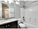 Bathroom vanity with granite countertops, shower and tub combo with updated fixtures at 16141 N 183Rd Dr, Surprise, AZ 85388