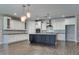 Eat-in kitchen with a center island, stainless steel appliances, and white subway tile backsplash at 16141 N 183Rd Dr, Surprise, AZ 85388
