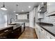 Bright kitchen featuring stainless steel appliances, undermount sink, tile backsplash and ample counter space at 16141 N 183Rd Dr, Surprise, AZ 85388