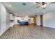 Open-concept living space featuring an eat-in kitchen with a center island and modern appliances at 16141 N 183Rd Dr, Surprise, AZ 85388