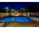 Stunning pool and spa area with unique rock feature and lush landscaping provides a tranquil oasis at 16141 N 183Rd Dr, Surprise, AZ 85388