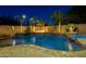 Stunning pool and spa area with fire feature and lush landscaping provides a tranquil oasis at 16141 N 183Rd Dr, Surprise, AZ 85388