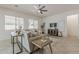 Inviting living room with tile floors, neutral furnishings, and well-lit ambiance at 16158 W Coronado Rd, Goodyear, AZ 85395