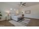 A well lit main bedroom provides access to the main bath at 16158 W Coronado Rd, Goodyear, AZ 85395