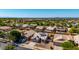 Aerial view of the property with its solar panels and view of the neighborhood at 1634 E Harwell Rd, Phoenix, AZ 85042