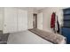Neutral bedroom with closet and view through doorway at 1634 E Harwell Rd, Phoenix, AZ 85042