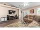 Inviting living space featuring a large television, providing a perfect spot for movie nights at 1634 E Harwell Rd, Phoenix, AZ 85042