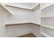 Walk-in closet with shelving and racks at 20428 N 32Nd Ln, Phoenix, AZ 85027