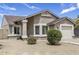 Charming single-story home featuring a low maintenance yard and attached one car garage at 20428 N 32Nd Ln, Phoenix, AZ 85027