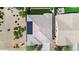 Aerial view of roof with solar panels above a home with desert landscaping and a two-car garage at 21104 E Poco Calle --, Queen Creek, AZ 85142