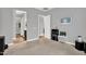 Bedroom with neutral paint, carpet, and an attached bathroom and closet at 21104 E Poco Calle --, Queen Creek, AZ 85142